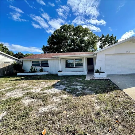 Rent this 3 bed house on 11898 Paige Drive in Bayonet Point, FL 34668