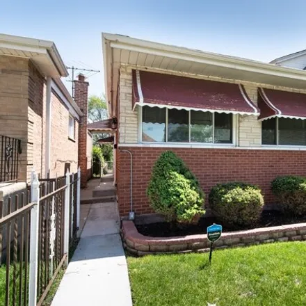 Buy this 3 bed house on 9005 South Union Avenue in Chicago, IL 60620