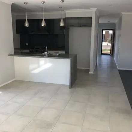 Rent this 4 bed apartment on 18 Sydney Way in Alfredton VIC 3350, Australia