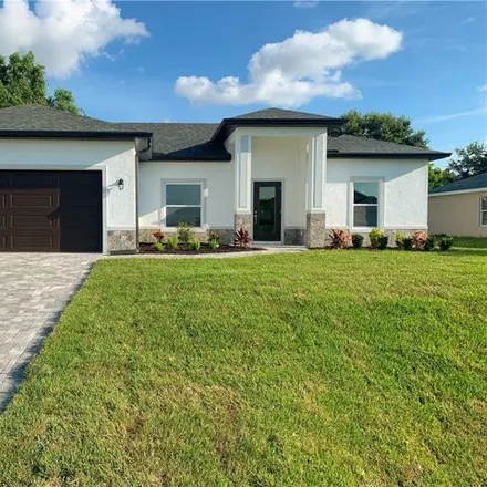 Buy this 3 bed house on 2890 Northwest 20th Place in Cape Coral, FL 33993