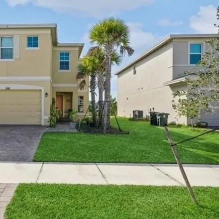 Buy this 4 bed house on 2064 Northwest Cataluna Circle in Port Saint Lucie, FL 34986