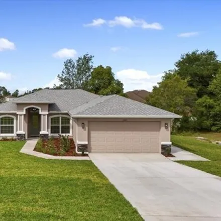 Buy this 3 bed house on 5439 Idleweise Court in Spring Hill, FL 34606