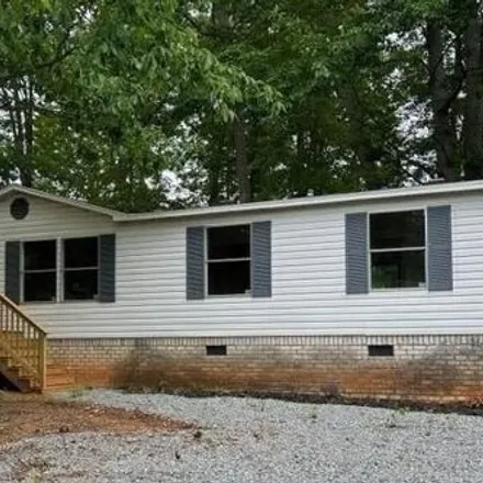 Buy this studio apartment on 3209 Butner Mill Road in Yadkin County, NC 27018