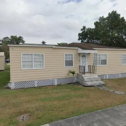 Buy this 4 bed house on 277 East 4th Street in Pahokee, Palm Beach County