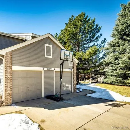 Rent this 3 bed house on 14822 East Penwood Place in Aurora, CO 80015