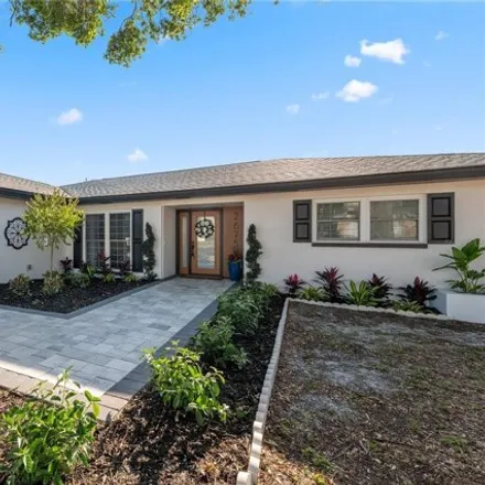 Buy this 3 bed house on 2671 Pinewood Drive in Dunedin, FL 34698