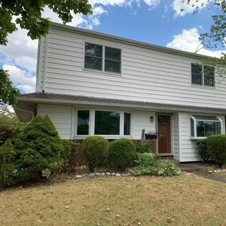 Rent this 4 bed house on 345 Coleridge Street in Levittown, NY 11756