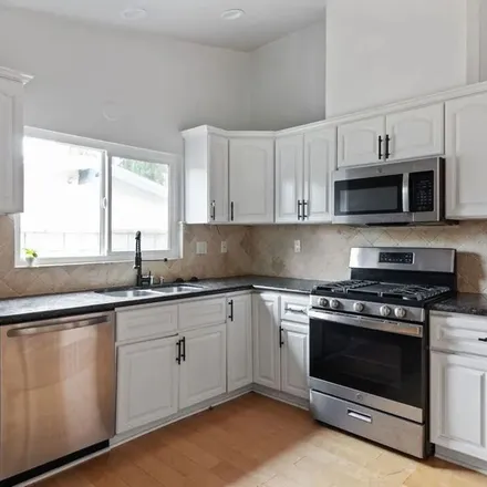Rent this 5 bed apartment on 5639 Kelvin Avenue in Los Angeles, CA 91367