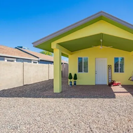 Buy this 2 bed house on 6035 South 12th Place in Phoenix, AZ 85040