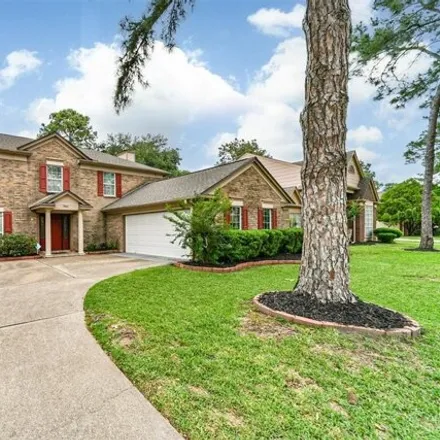 Buy this 4 bed house on 7411 Magnolia Shadows Ln in Houston, Texas