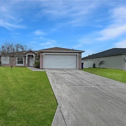 Rent this 3 bed house on 2655 Nature Pointe Loop in Olga, Lee County