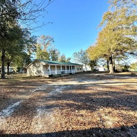 Buy this 4 bed house on 7896 Suellen Street in Sneads, Jackson County