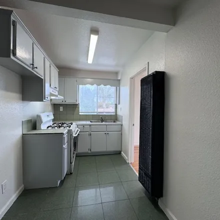 Rent this 2 bed apartment on 1818 Canal Avenue in Long Beach, CA 90810