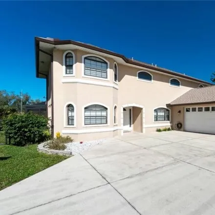 Buy this 4 bed house on 12000 Chancellor Boulevard in North Port, FL 33953