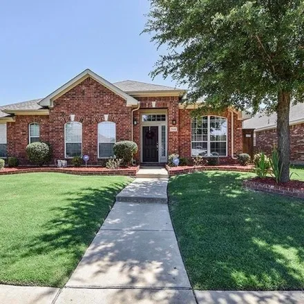 Rent this 4 bed house on 7942 Wilmington Drive in Rowlett, TX 75089