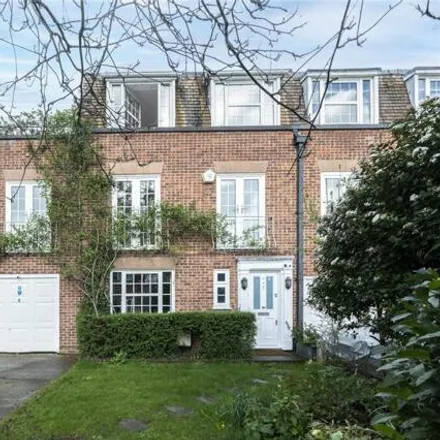 Rent this 4 bed townhouse on Newstead Way in London, SW19 5HR