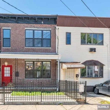 Buy this 4 bed house on 127 Lincoln Street in Jersey City, NJ 07307