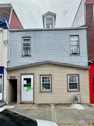Buy this studio house on L & M Automotive Specialists in 210 Gordon Street, Allentown