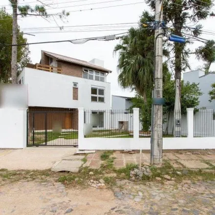 Buy this 2 bed house on Rua Jacipuia in Guarujá, Porto Alegre - RS