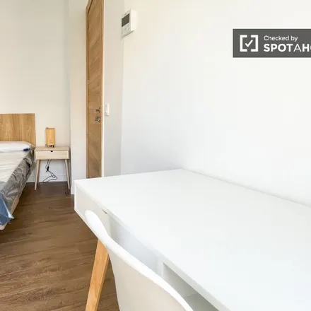 Rent this 4 bed room on Calle de Manuel Álvarez in 28047 Madrid, Spain