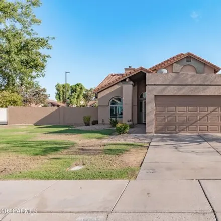 Buy this 4 bed house on 1213 W Sand Dune Dr in Gilbert, Arizona