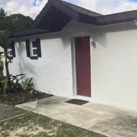 Buy this 4 bed house on 1806 Hacienda Way in Holiday, FL 34690