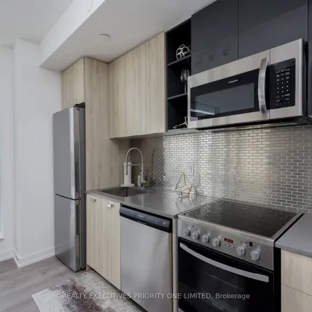 Image 3 - 7 Kodiak Crescent, Toronto, ON M3K 3E5, Canada - Apartment for rent