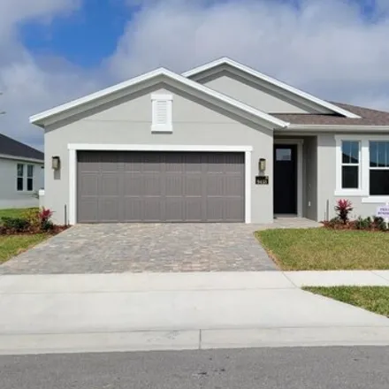 Rent this 4 bed house on Ebeko Court in Brevard County, FL 32940