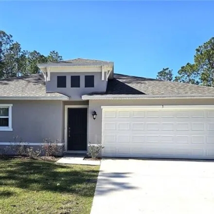Rent this 3 bed house on 4 Kashmir Trail in Palm Coast, FL 32164
