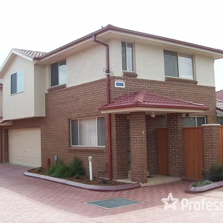 Rent this 3 bed townhouse on 19-21 Marsh Parade in Casula NSW 2170, Australia