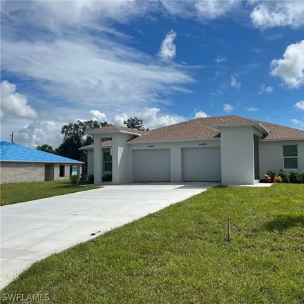 Rent this 3 bed duplex on 6061 Laurelwood Drive in River Hall, Lehigh Acres