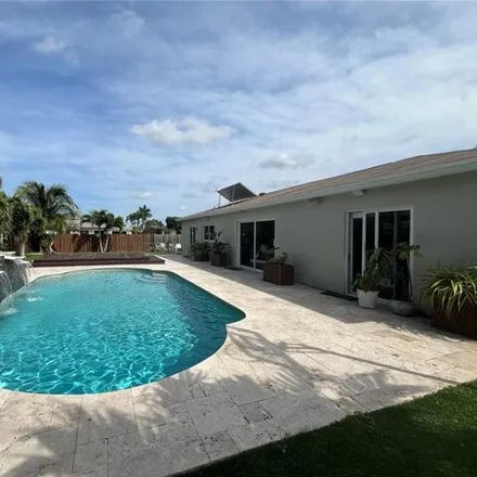 Rent this 4 bed house on 6909 Northwest 82nd Court in Tamarac, FL 33321