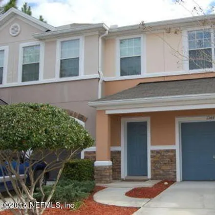 Rent this 2 bed condo on 13489 Prism Court in Jacksonville, FL 32258