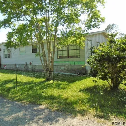 Buy this 3 bed house on 2287 Avocado Boulevard in Flagler County, FL 32110