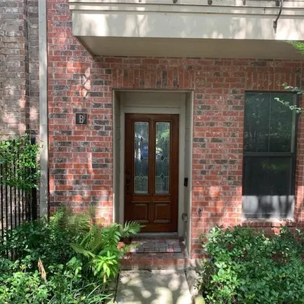 Rent this 2 bed townhouse on 2992 Chenevert Street in Houston, TX 77004