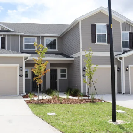 Buy this 2 bed townhouse on 5636 Crest Creek Drive in Jacksonville, FL 32258