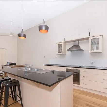 Rent this 3 bed townhouse on Hooper Street in Belgian Gardens QLD 4810, Australia