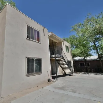 Buy this 8 bed house on 145 General Arnold Street Northeast in Albuquerque, NM 87123