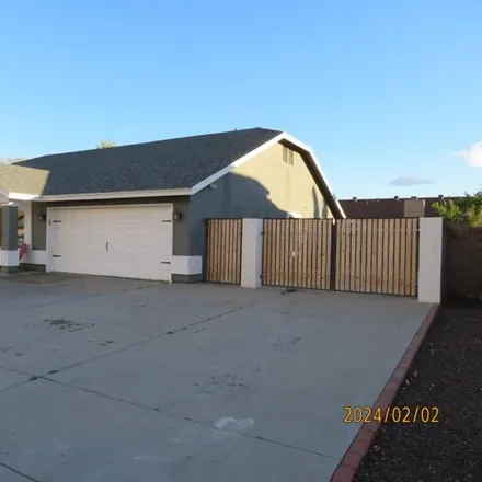 Rent this 4 bed house on 6373 West Angela Drive in Glendale, AZ 85308