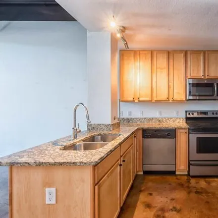 Rent this 2 bed condo on 420 North Adams Street in Tallahassee, FL 32303