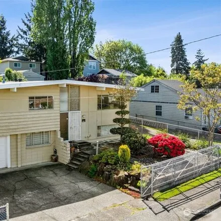 Buy this 4 bed house on 6726 45th Avenue South in Seattle, WA 98118