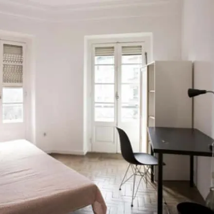 Rent this 7 bed room on Rua José Estevão 24 in 1150-192 Lisbon, Portugal