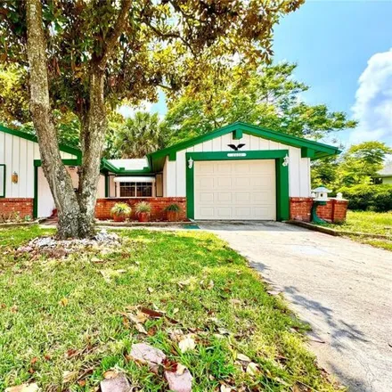 Buy this 2 bed house on 8000 Wild Flower Row in Bayonet Point, FL 34667