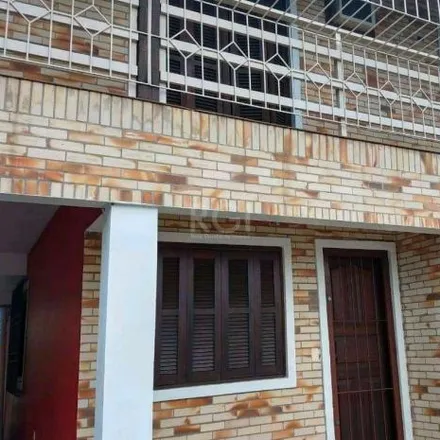 Buy this 4 bed house on Rua Miguel Ascoleze in Vila Nova, Porto Alegre - RS
