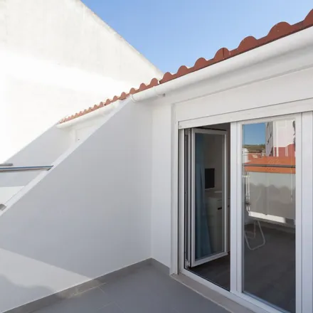 Image 3 - Kuta Beach House, Rua Bulhão Pato, 2825-394 Costa da Caparica, Portugal - Apartment for rent