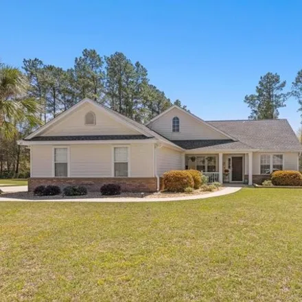 Buy this 4 bed house on 99 Cardinal Court in Crawfordville, FL 32327
