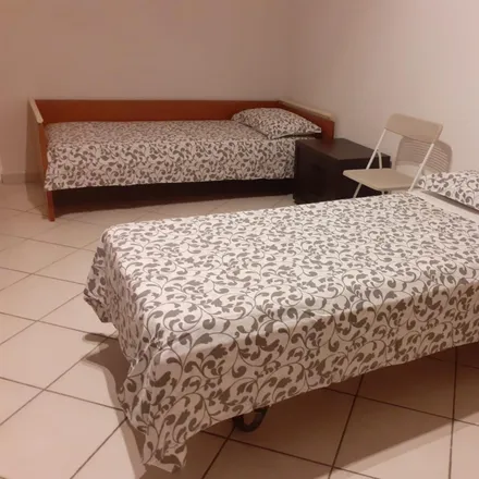 Rent this 4 bed room on Via Mecenate in 5, 20138 Milan MI