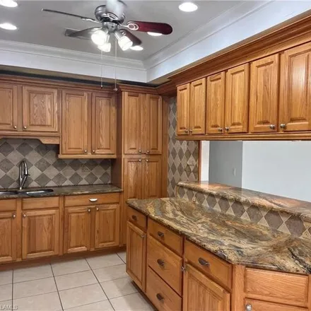 Rent this 4 bed house on 2863 Poinciana Street in Collier County, FL 34105
