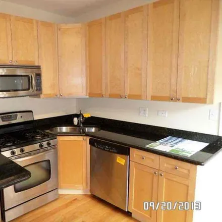 Rent this 2 bed condo on 847 E 52nd Street