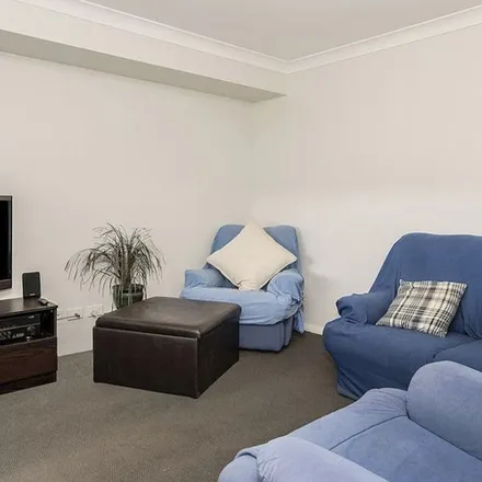 Rent this 4 bed apartment on Birch Grove in Aberglasslyn NSW 2320, Australia